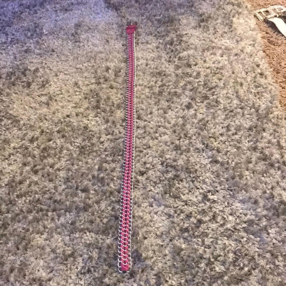 Hot pink belt.